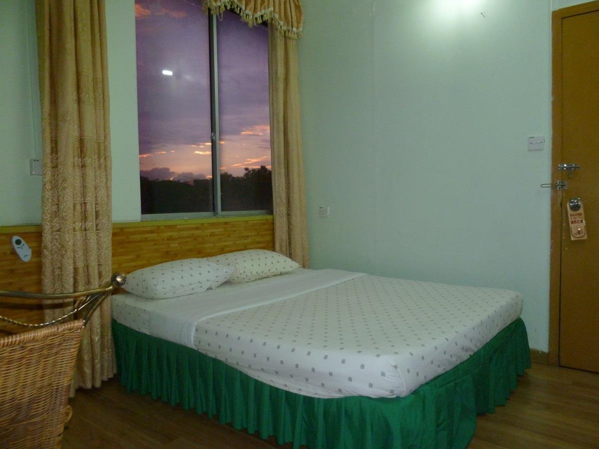 7 Hung Hung Inn Кота-Кинабалу Экстерьер фото